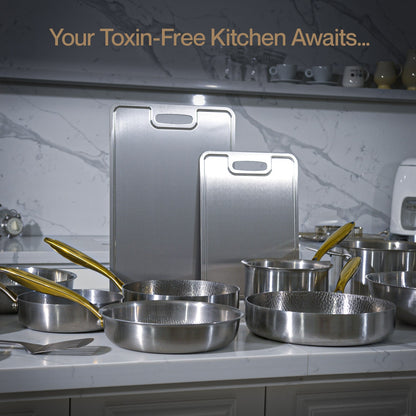 Stainless steel cookware on a kitchen counter